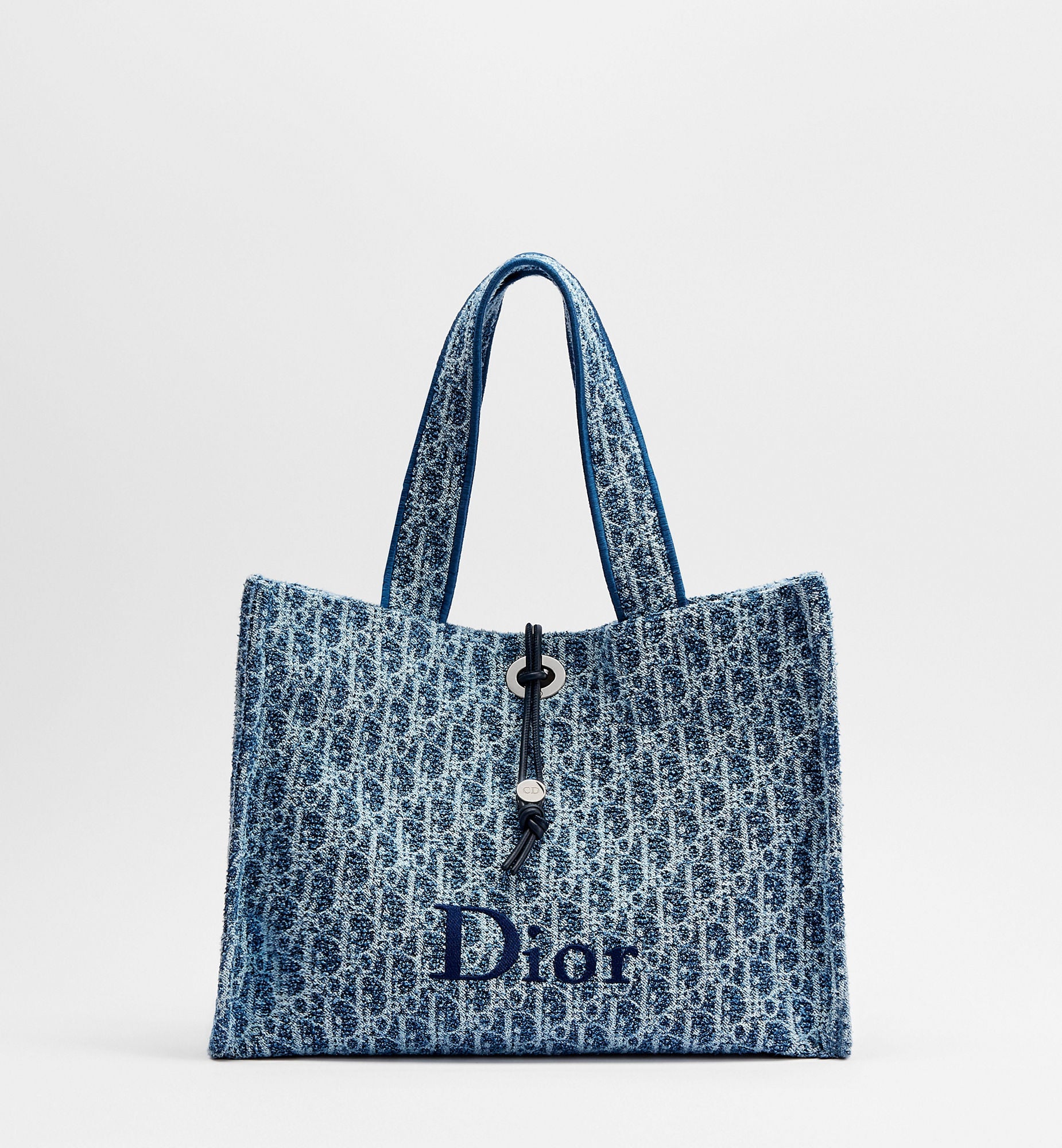 Women's Medium Spongy Book Tote With Blue Textured Fabric And Drawstring Closure