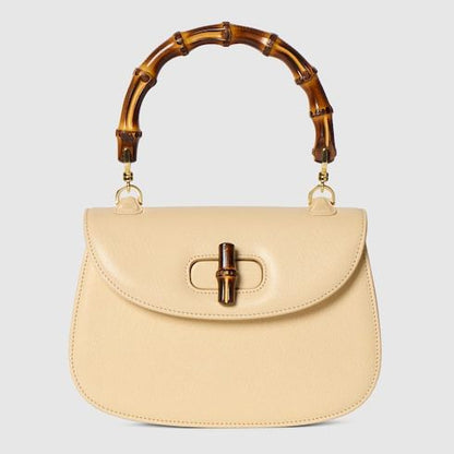 Women's Small Top Handle Bag With Soft Grainy Leather And Click Closure