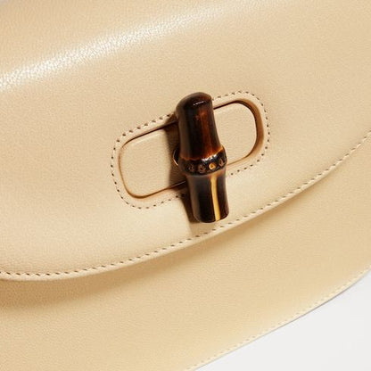 Women's Small Top Handle Bag With Soft Grainy Leather And Click Closure