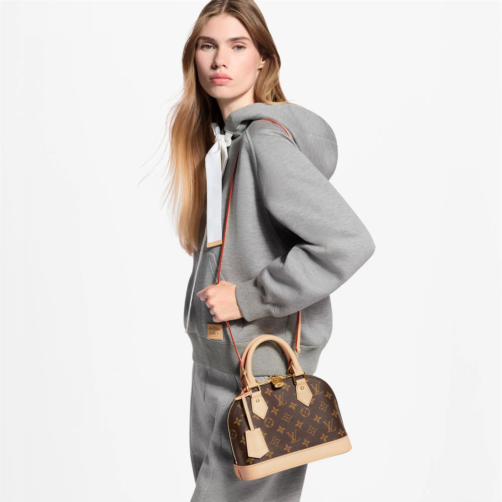 Women's Alma BB Monogram Canvas Top Handle Bag