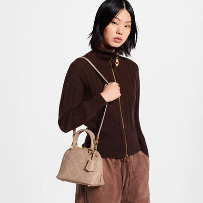 Women's Alma BB Hazelnut Couture Monogram Empreinte Leather Handbag M28458